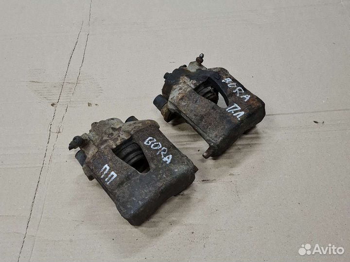 Суппорт передний Volkswagen Bora A4 Фольксваген Го