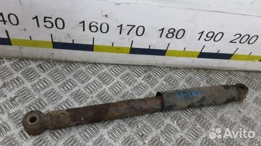 Амортизатор задней балки nissan navara D40 (8NI19L