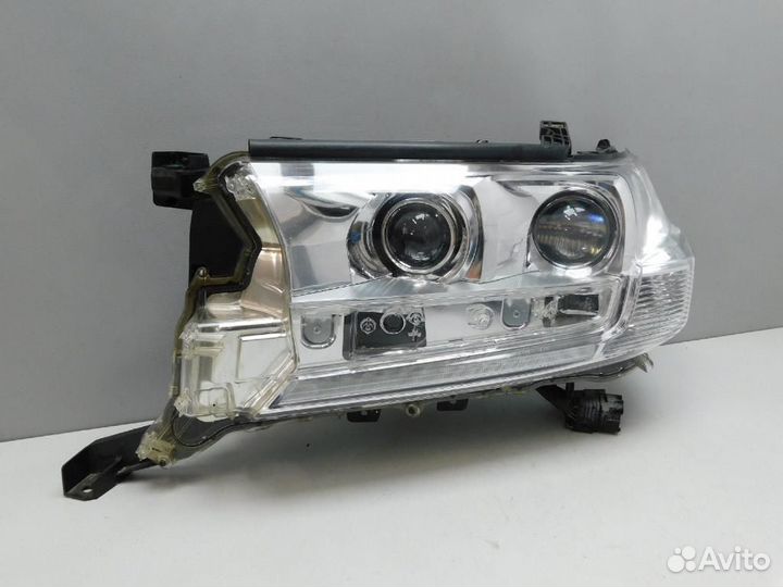 Фара левая Toyota Land Cruiser