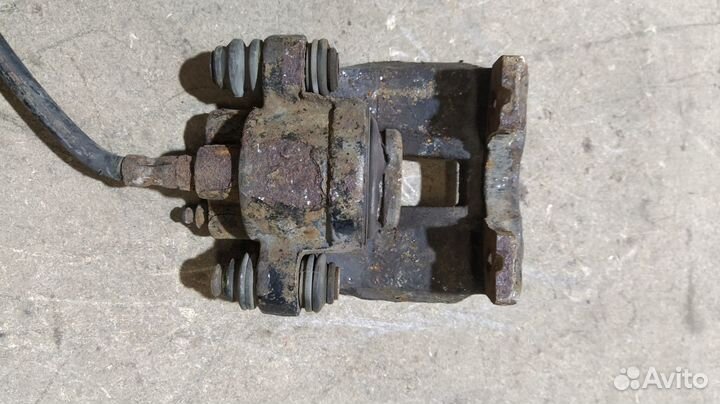 Суппорт тормозной задний левый Mercedes W163