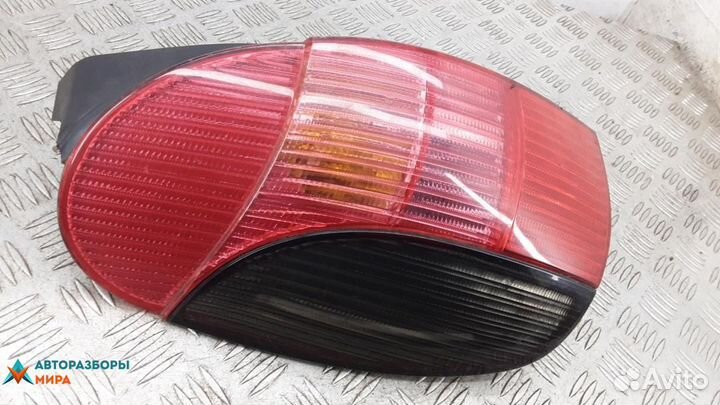 Фонарь задний левый Peugeot 306 рест. 2001