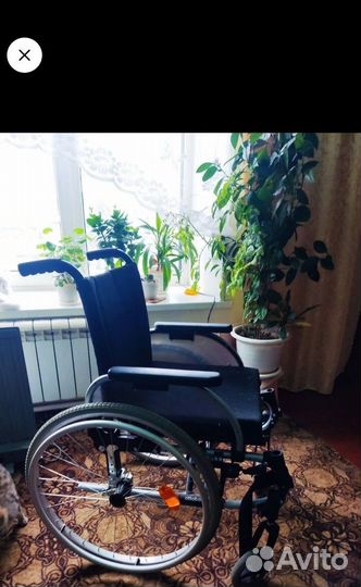 Инвалидная коляска