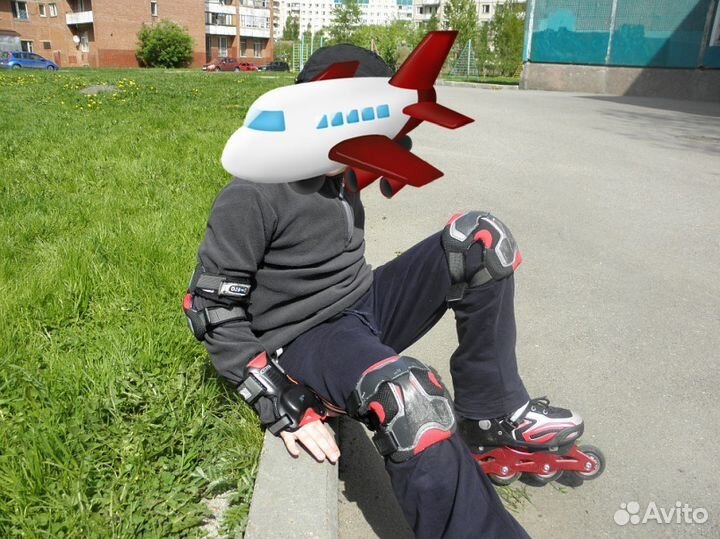 Роликовые коньки