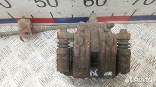 Суппорт тормозной задний правый KIA RIO 2 (EDN17OO