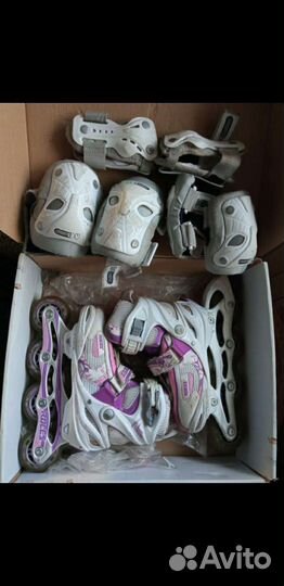 Роликовые коньки