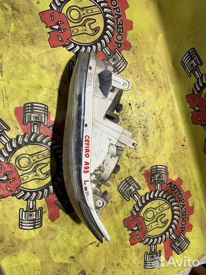 Фара передняя левая оригинал Nissan Cefiro A33