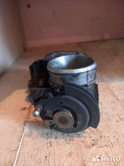 Дроссельная заслонка Ауди А4 1.8т 058133063C