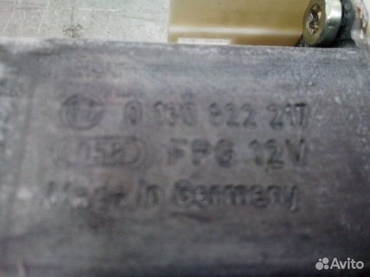 Моторчик стеклоподъемника передний левый Ford