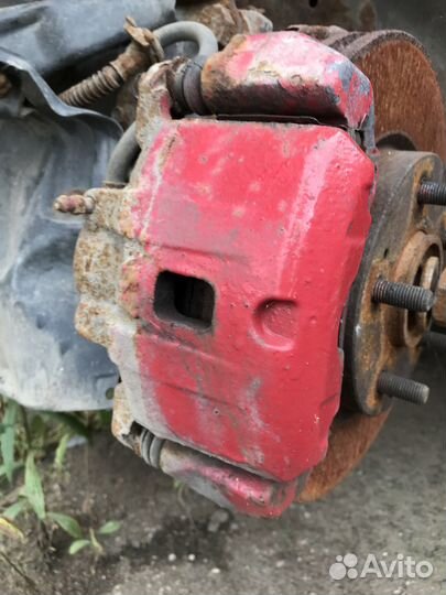 Суппорт передний левый Mitsubishi Galant 8 2.4i