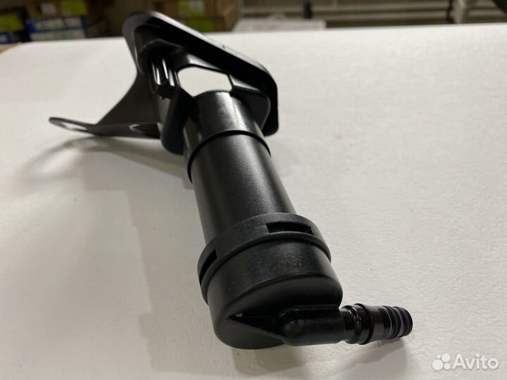 Форсунка омывателя фар