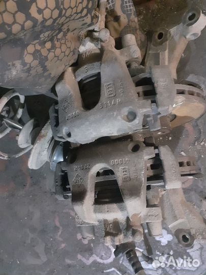 Суппорт тормозной передний Renault Logan 2