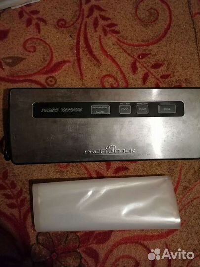 Вакуумный упаковщик