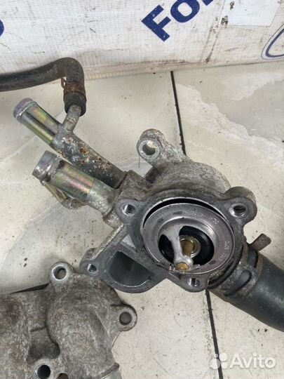 Корпус термостата Kia Rio 2 JB 1.4 (G4EE) 2009