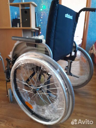 Инвалидная коляска