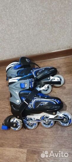 Роликовые коньки