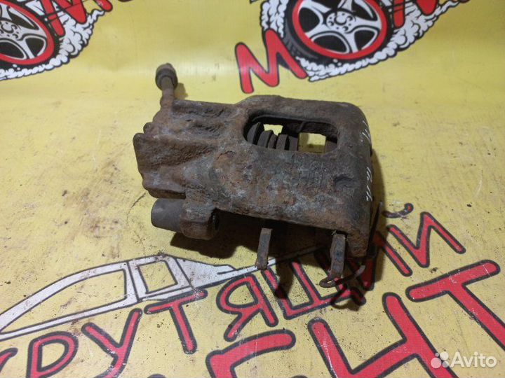 Суппорт тормозной передний левый Ford Focus 1 I