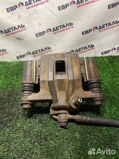 Суппорт тормозной задний левый Chevrolet Lacetti