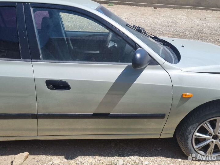Задняя левая дверь elantra