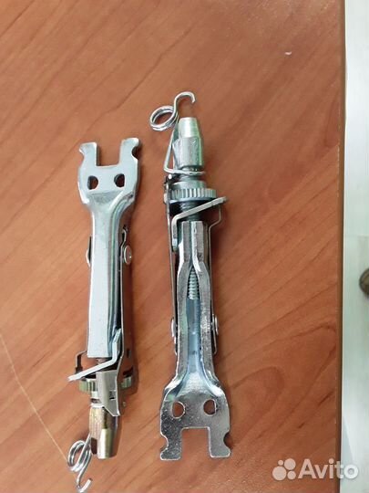 Механизм регулировки колодок ручника renault