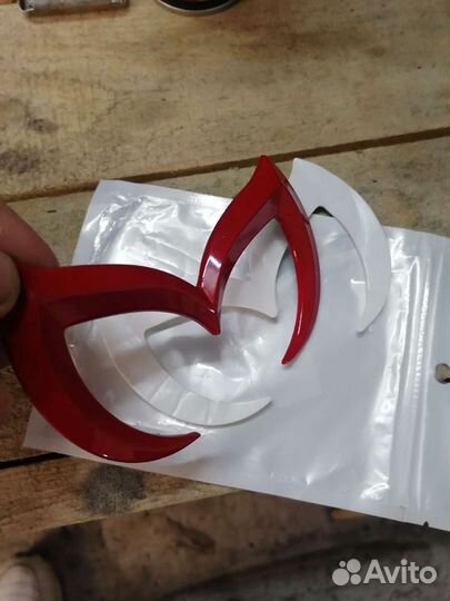 Эмблема mazda