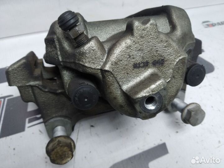 Суппорт тормозной передний Volkswagen Tiguan I рес