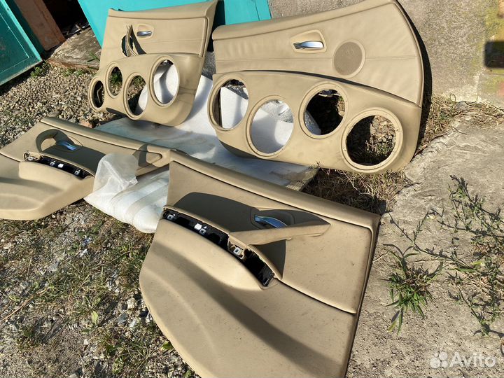 Обшивки дверей BMW E90