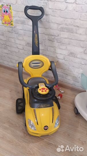 Детская машинка каталка с ручкой