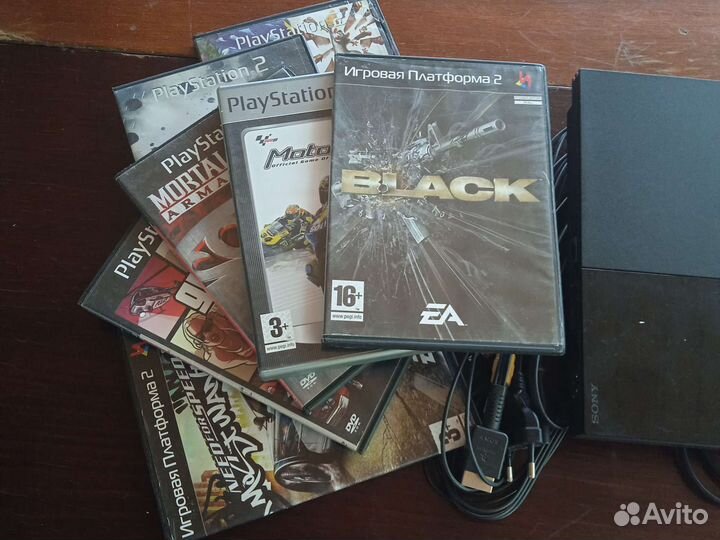 Sony PS2 прошитая (49 дисков)