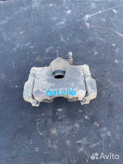 Суппорт тормозной передний левый VW Polo