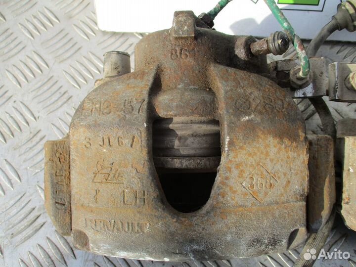 Суппорт тормозной перед.правый Renault Laguna 2