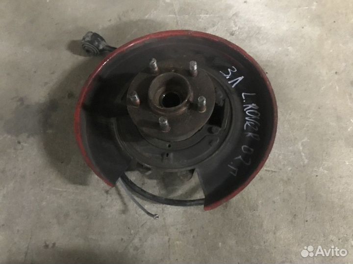 Кулак поворотный задний левый