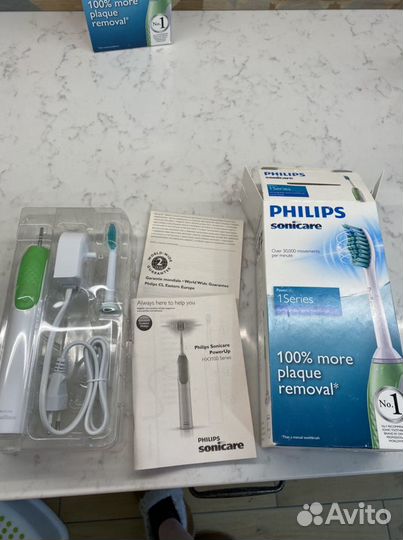 Электрическая зубная щетка