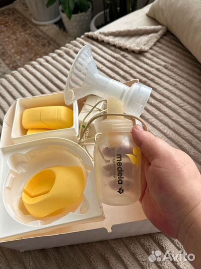 Молокоотсос medela электрический