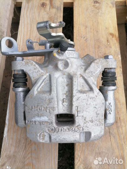 Задний тормозной суппорт мазда 3 bm