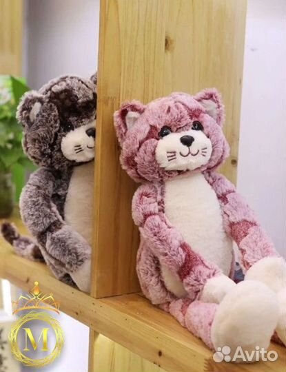 Игрушка котик с которым очень удобно спать