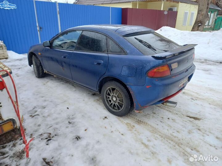 Mazda 323f Мазда двери