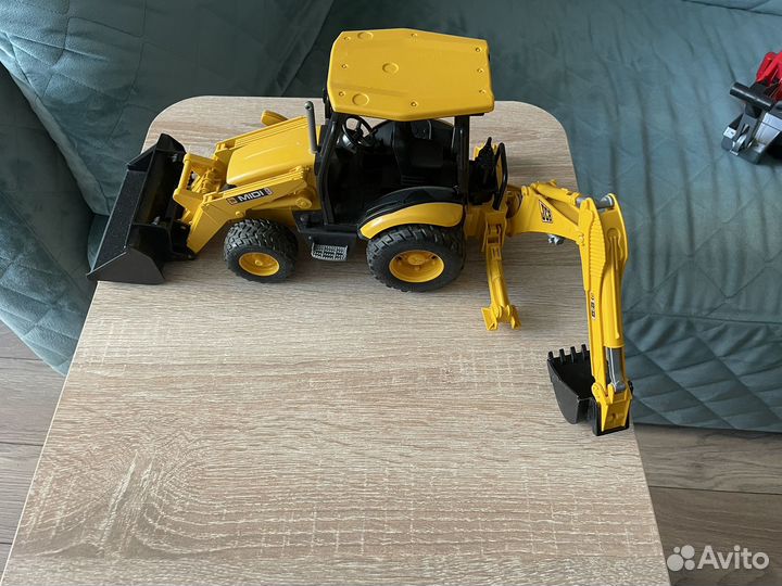 Детские игрушки трактор