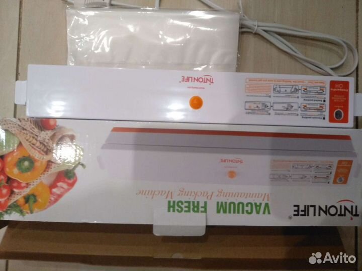 Вакуумная упаковочная машина