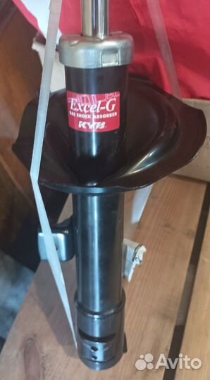 Стойка амортизатора Mitsubishi Outlander XL