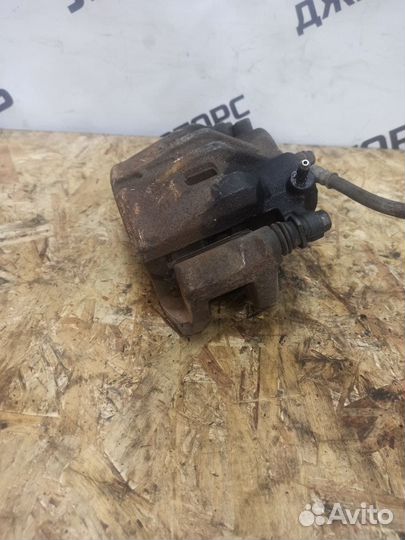 Суппорт передний левый Nissan X-Trail T30