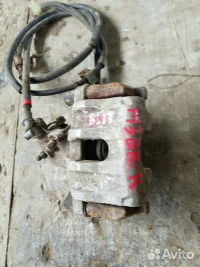 Суппорт задний левый правый Mazda 3 BK