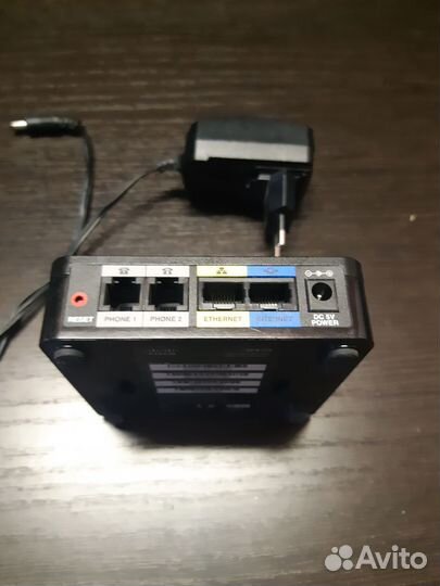 Шлюз для VoIP-телефонии Cisco SPA122