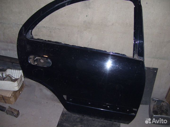 Ниссан альмера классик дверь