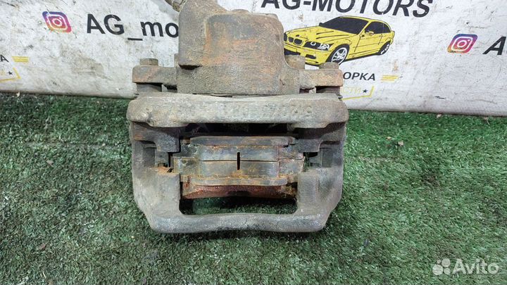 Суппорт тормозной передний левый Logan 1