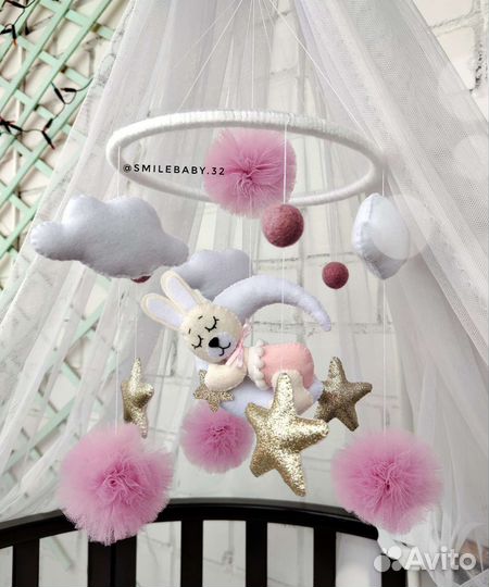 Мобиль в кроватку новый