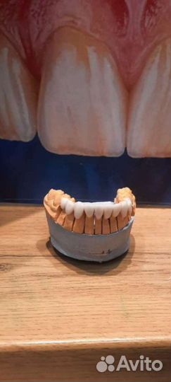 Зубной техник