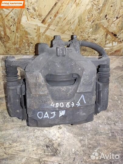 Суппорт тормозной передний левый Opel Astra J