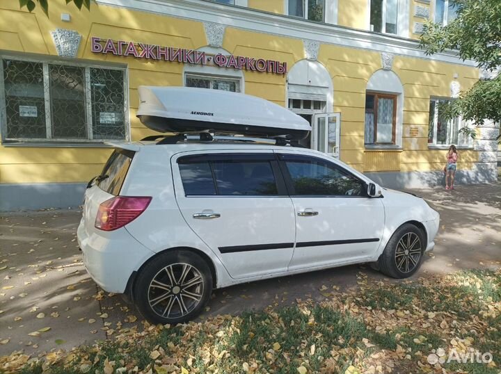 Автобокс Aerobox 470л двусторонний на Джили мк