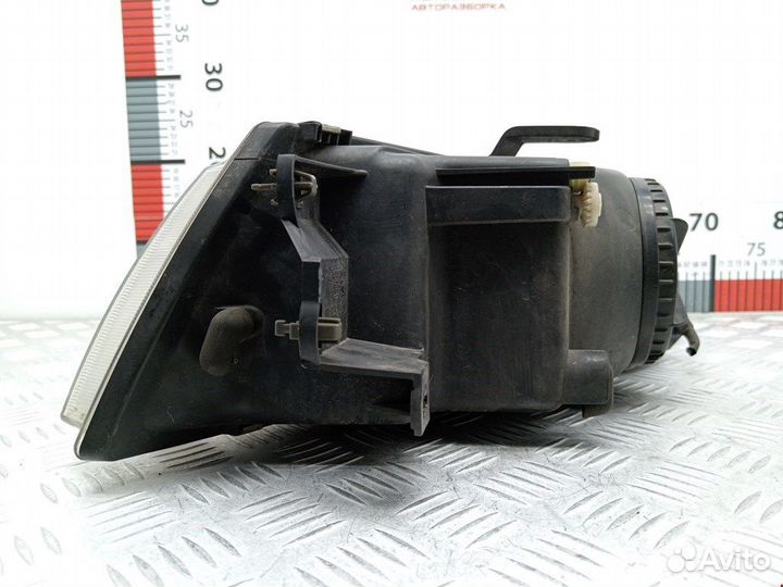 Фара передняя для Mitsubishi Carisma MR972794