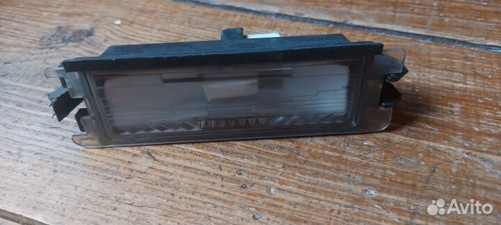 Фонарь подсветки номера Renault Logan 1